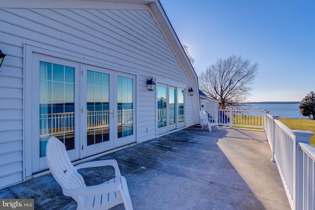 view of patio / terrace featuring a water view