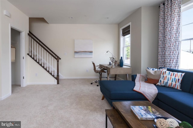 living room with light colored carpet