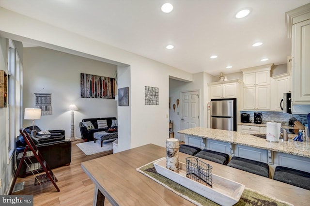 dining area featuring light hardwood / wood-style flooring