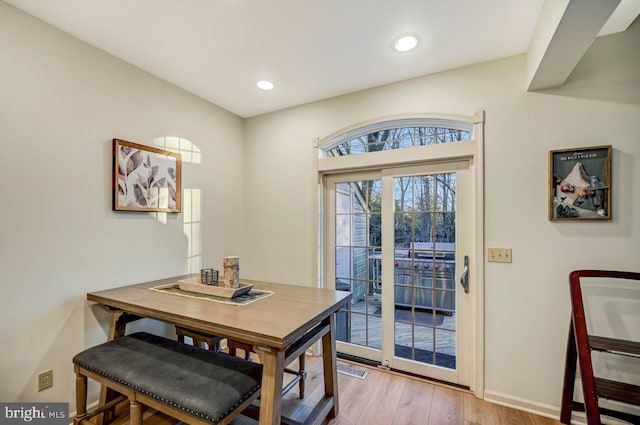 dining room featuring light hardwood / wood-style floors