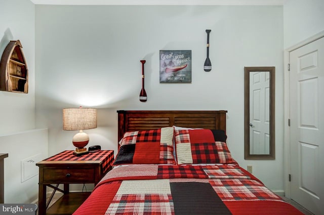 bedroom featuring dark wood-type flooring