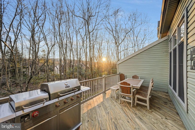 wooden deck with grilling area