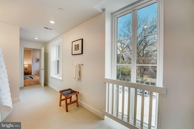 hall with light wood-type flooring