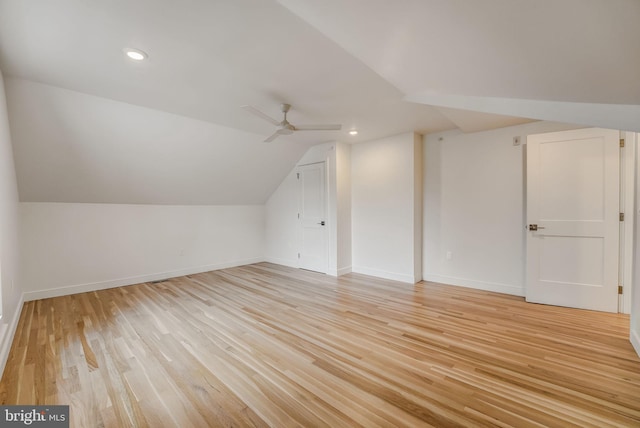 bonus room with lofted ceiling, ceiling fan, and light hardwood / wood-style flooring