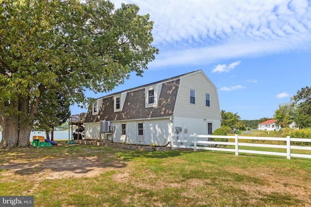 exterior space with a deck and a yard