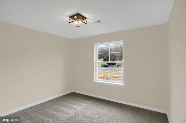 unfurnished room with carpet floors