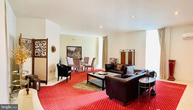 carpeted living room featuring a wall unit AC