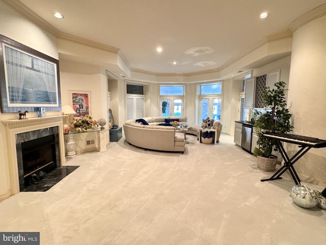 living room with french doors, a fireplace, crown molding, and carpet flooring