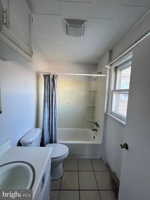 full bathroom featuring shower / tub combo, vanity, toilet, and tile floors