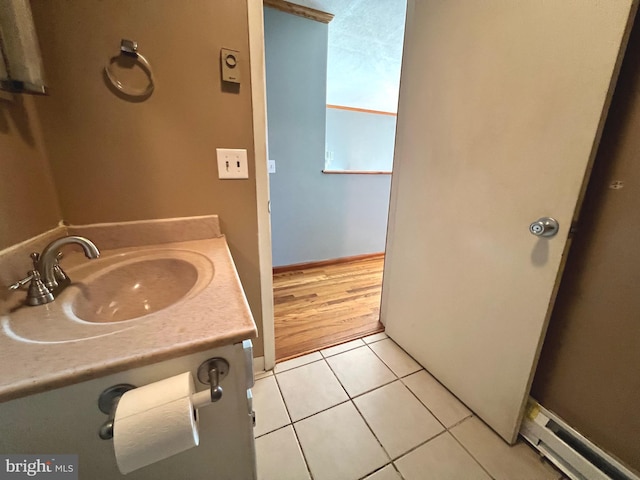 bathroom featuring vanity and wood-type flooring