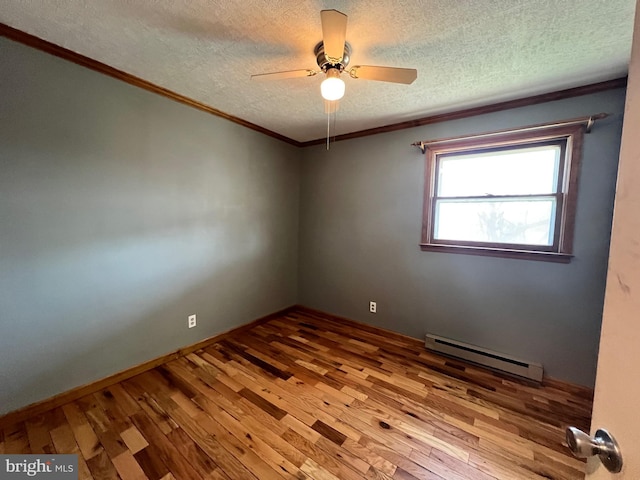 unfurnished room featuring light hardwood / wood-style flooring, ceiling fan, a baseboard radiator, and a textured ceiling