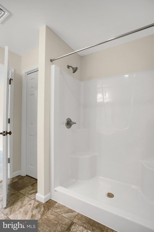 bathroom with walk in shower