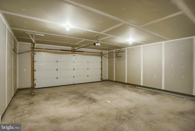 garage featuring a garage door opener