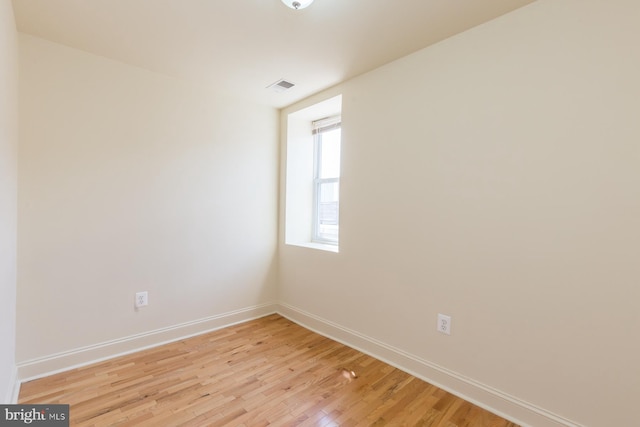 empty room featuring light hardwood / wood-style floors