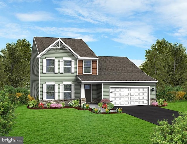 view of front facade with a front yard and a garage