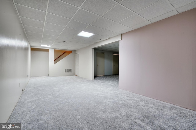 interior space with a drop ceiling