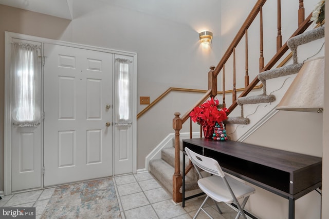 view of tiled foyer entrance