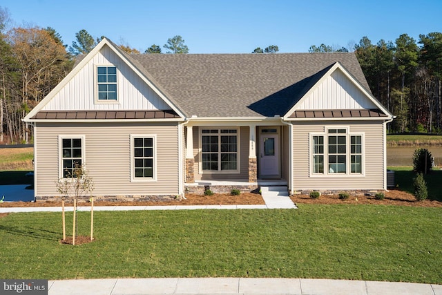 view of front of home with a front lawn