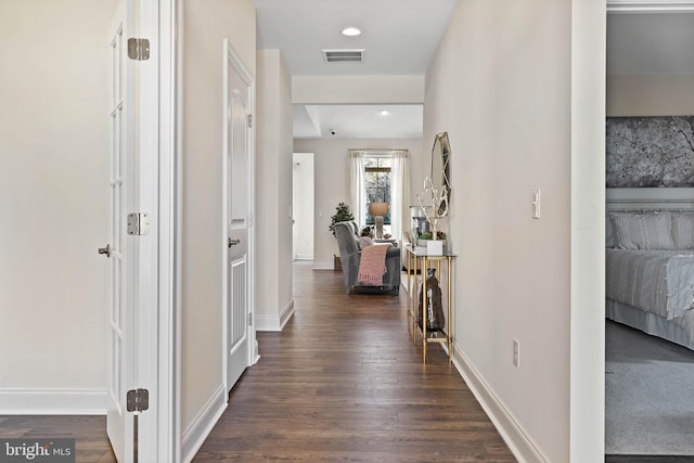 hall featuring dark hardwood / wood-style floors