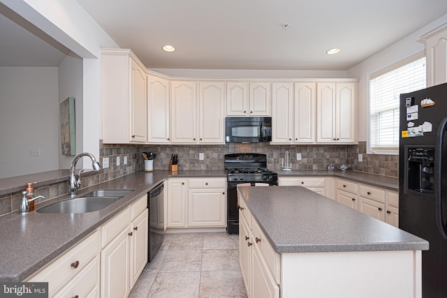 kitchen with backsplash, light tile flooring, sink, and black appliances