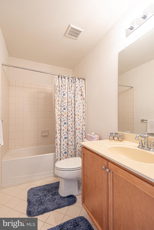 full bathroom with tile flooring, toilet, oversized vanity, and shower / tub combo with curtain