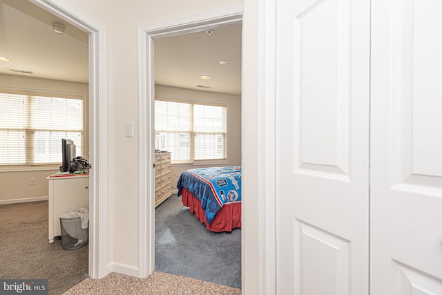 bedroom with light colored carpet