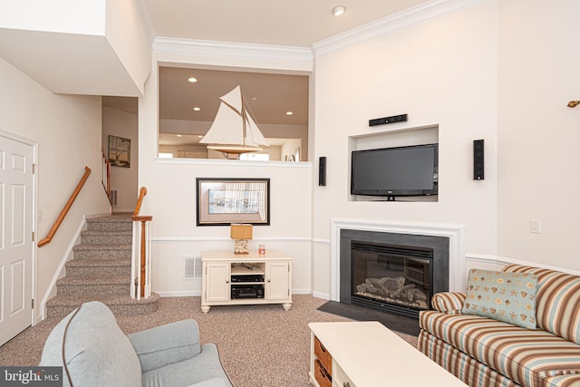 living room with crown molding and light colored carpet