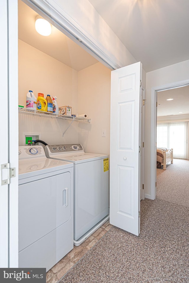 laundry room with light carpet, independent washer and dryer, and hookup for a washing machine