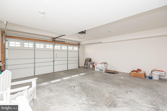 garage featuring a garage door opener