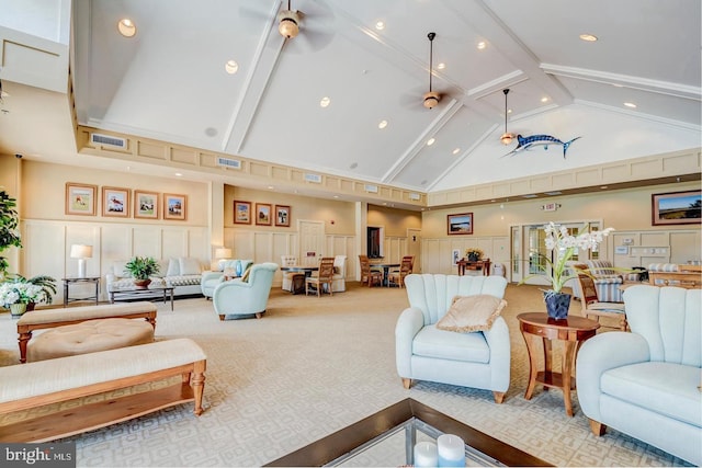 carpeted living room featuring high vaulted ceiling, beamed ceiling, and ceiling fan