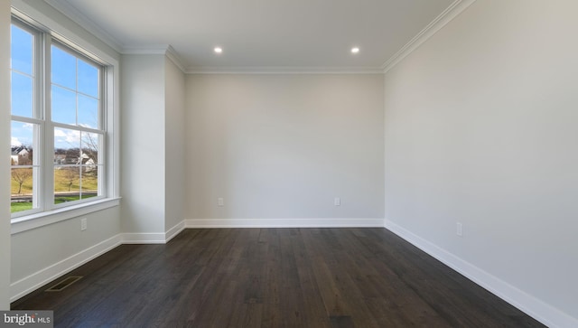 unfurnished room with dark hardwood / wood-style floors and ornamental molding