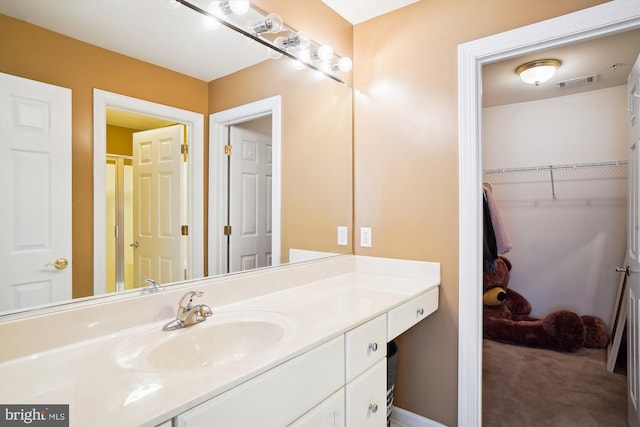 bathroom featuring large vanity