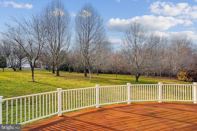 deck featuring a lawn