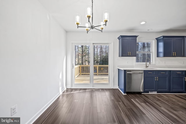 kitchen with dark hardwood / wood-style flooring, a chandelier, sink, dishwasher, and hanging light fixtures