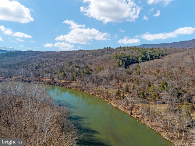 bird's eye view featuring a water and mountain view