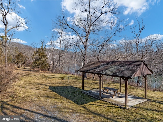 view of home's community featuring a patio, a gazebo, and a yard