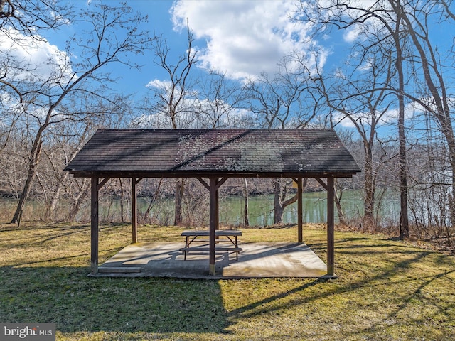 view of nearby features featuring a water view, a yard, a gazebo, and a patio