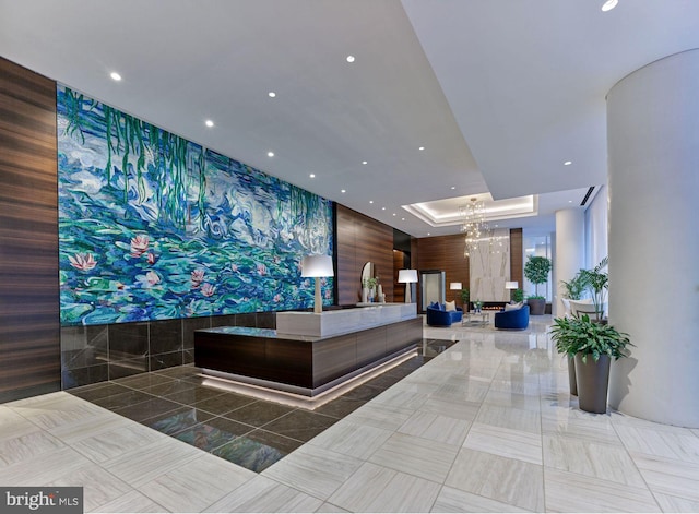 reception area featuring a chandelier