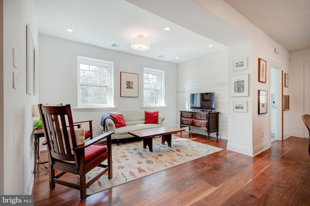 living room featuring dark hardwood / wood-style flooring