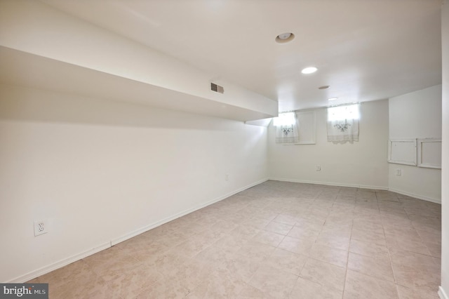 empty room with light tile flooring