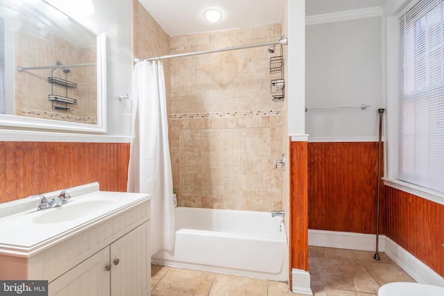 bathroom featuring shower / bath combo, tile floors, ornamental molding, and vanity