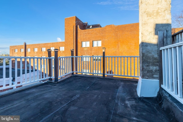 view of patio / terrace with a balcony