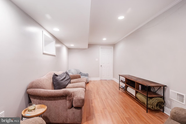 living room with light hardwood / wood-style floors