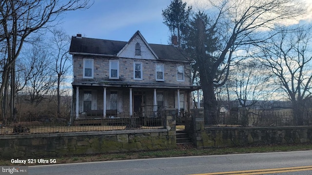 view of front of house featuring covered porch