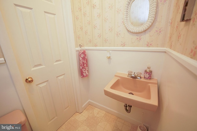 bathroom with sink and tile flooring