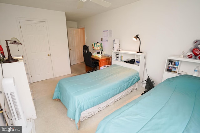 bedroom with carpet flooring and ceiling fan