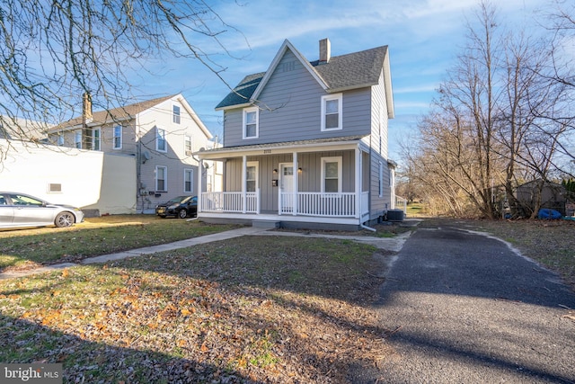 view of front of property featuring covered porch