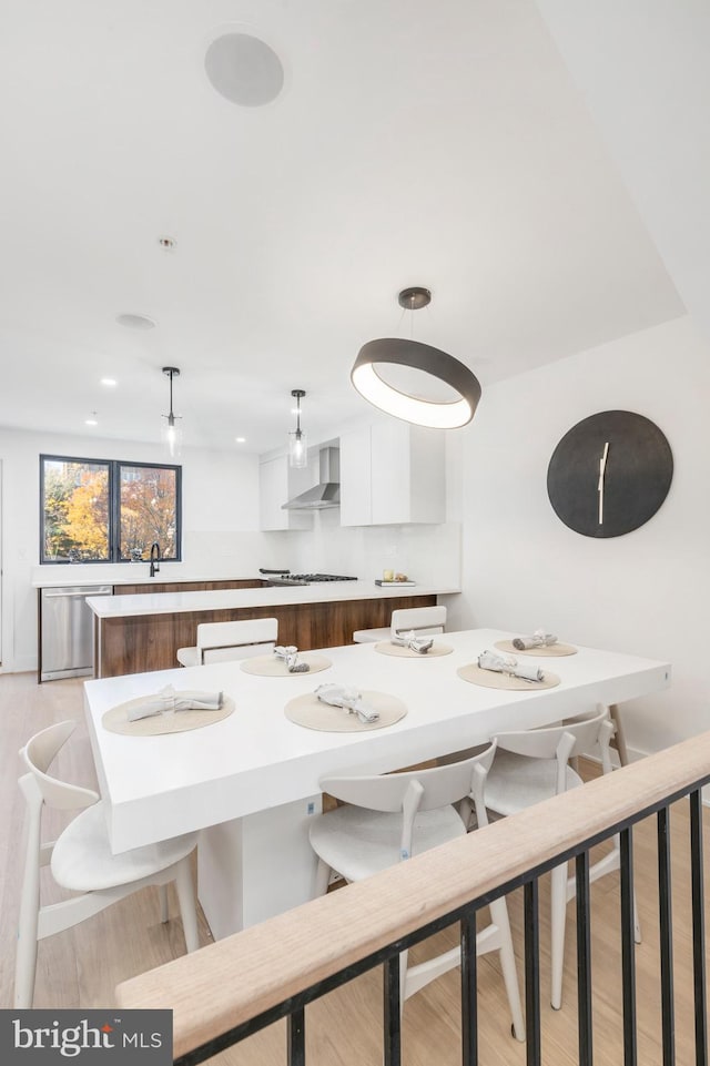 dining room featuring light wood-type flooring