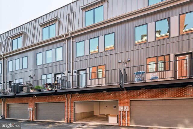 view of building exterior featuring a garage