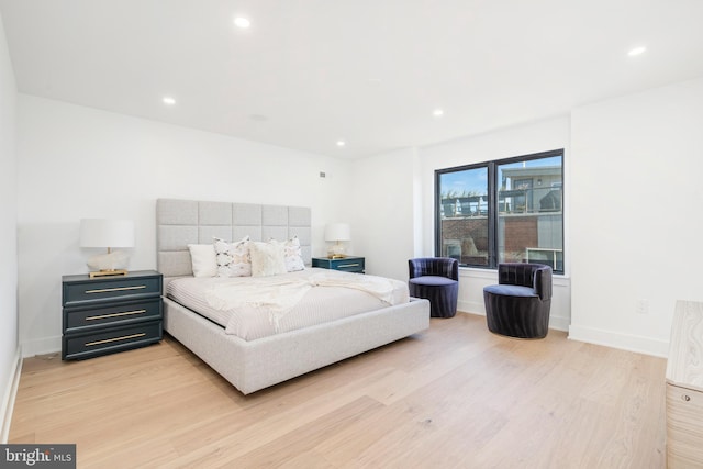 bedroom featuring light hardwood / wood-style flooring